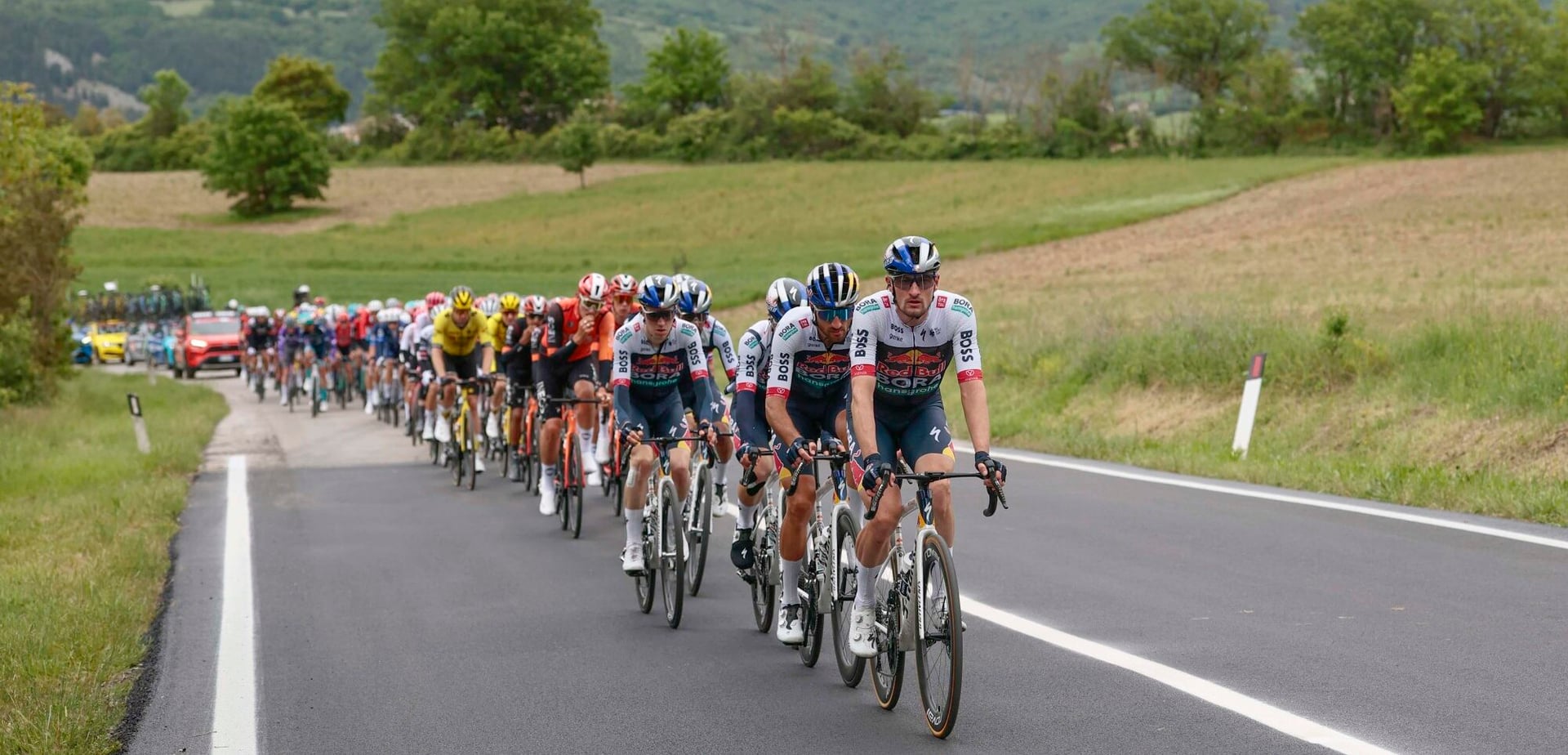 Talk about a stunt: Red Bull-BORA-hansgrohe riders pull plane into the air